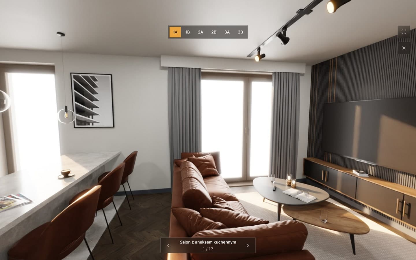 Spacer 360 po wnętrzu mieszkania typu 1A: salon z aneksem kuchennym i wyspą barową, nad panoramą przełącznik sześciu typów lokali, w rogu przyciski pełnego ekranu i zamknięcia, a u dołu nazwa ujęcia ze strzałkami do kolejnych pomieszczeń
